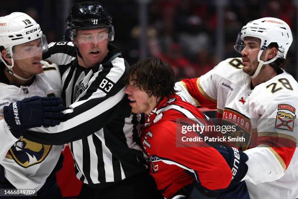 Oshie of the Washington Capitals and Matthew Tkachuk of the Florida Panthers are separated during the second period at Capital One Arena on February...
