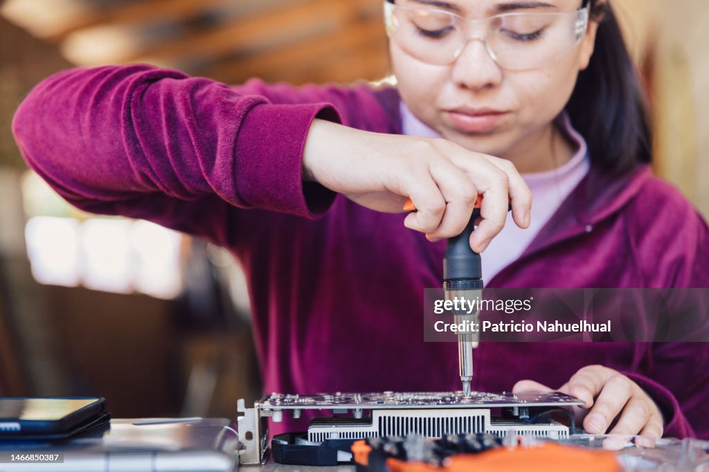 Computer Assembly Girl Young Female Student Using A Screwdriver For Assemble A Computer ...