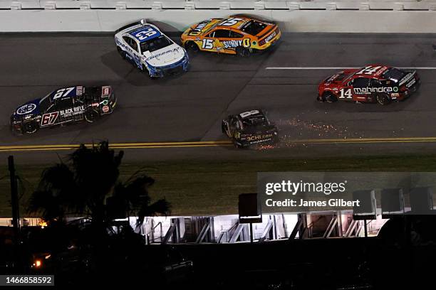 Austin Hill, driver of the Bennett Transportation/Beard Chevrolet, Riley Herbst, driver of the SunnyD Ford, and Kyle Busch, driver of the 3CHI...