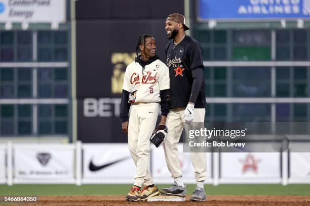 Travis Scott and Tracy McGrady are seen during the 2023 Cactus Jack Foundation HBCU Celebrity Softball Classic at Minute Maid Park on February 16,...