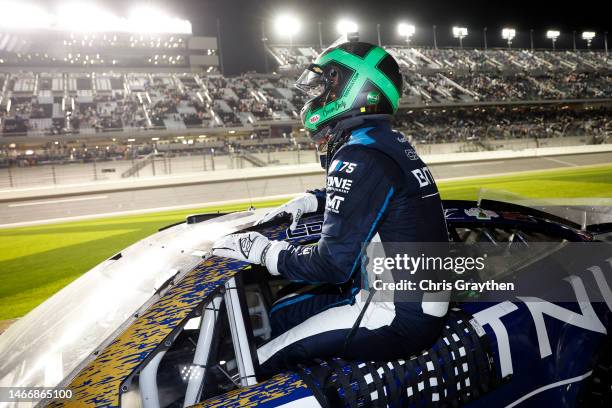 Conor Daly, driver of the BitNile.com Chevrolet, exits his car after the NASCAR Cup Series Bluegreen Vacations Duel at Daytona International Speedway...