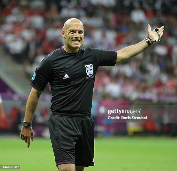 Referee Howard Webb gestures during the UEFA EURO 2012 quarter final match between Czech Republic and Portugal at The National Stadium on June 21,...