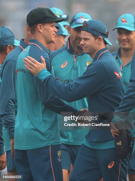 Matthew Kuhnemann of Australia is congratulated by Steve Smith after he was capped to play his first test match for Australia, during day one of the...