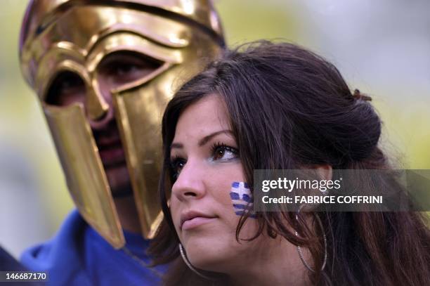 Greek fans wait for the Euro 2012 football championships quarter-final match Germany vs Greece on June 22, 2012 at the Gdansk Arena. AFP PHOTO /...