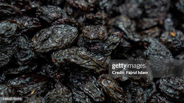 black date fruit - dried plum stock pictures, royalty-free photos & images