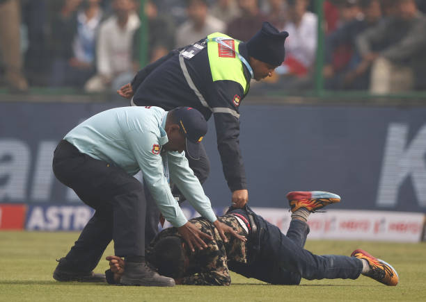 Pitch invader is seen during day one of the Second Test match in the series between India and Australia at Arun Jaitley Stadium on February 17, 2023...