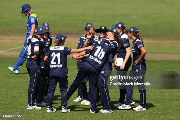 Ella Hayward of Victoria celebrates taking a catch to dismiss Rebecca Carter of the Meteors during the WNCL match between ACT and Victoria at EPC...