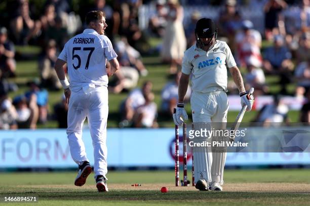 Ollie Robinson of England looks back at Scott Kuggeleijn of New Zealand after bowling him during day two of the First Test match in the series...