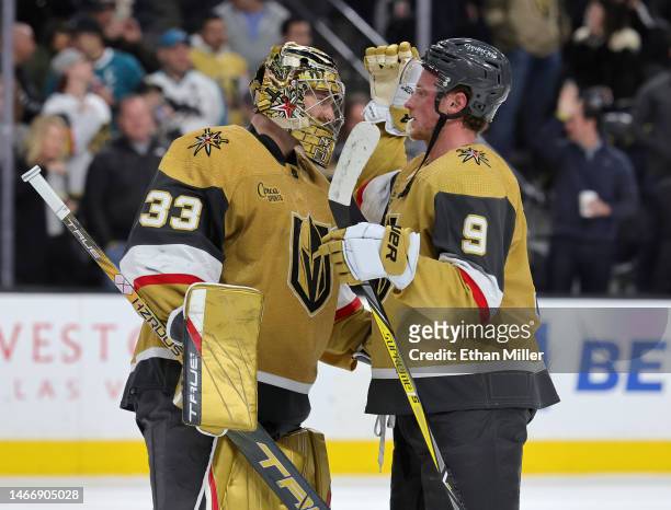 Adin Hill and Jack Eichel of the Vegas Golden Knights celebrate on the ice after the team's 2-1 victory over the San Jose Sharks at T-Mobile Arena on...