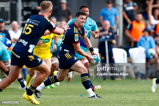 Freddie Burns of the Highlanders passes the ballduring the Super Rugby Pacific Trial Match between Highlanders and Moana Pasifika at thew Queenstown...