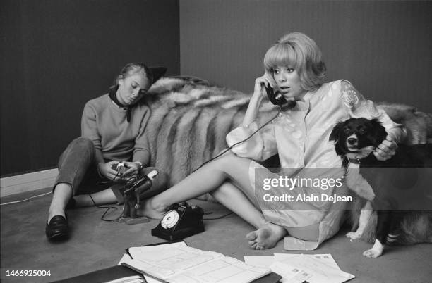 Actress Mireille Darc on the phone.