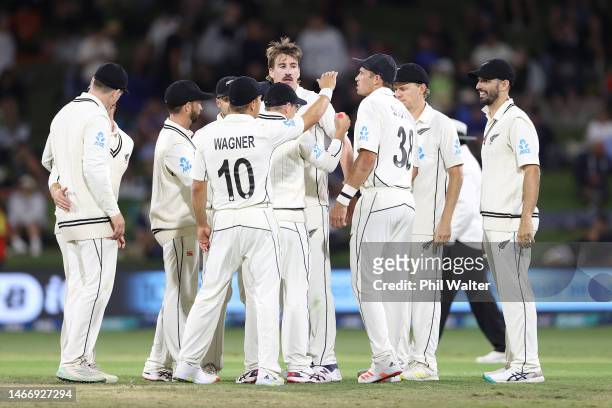Blair Tickner of New Zealand celebrates his wicket of Ben Duckett of England during day two of the First Test match in the series between the New...