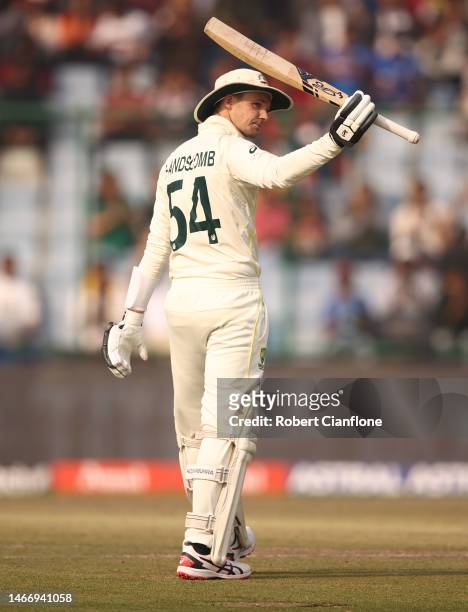 Peter Handscomb of Australia celebrates after scoring his half century during day one of the Second Test match in the series between India and...
