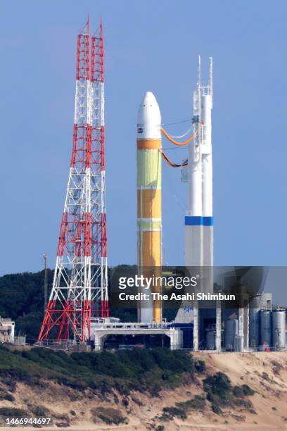 The H3 rocket remains on the launch pad after the scheduled liftoff time at the Japan Aerospace Exploration Agency Tanegashima Space Center on...