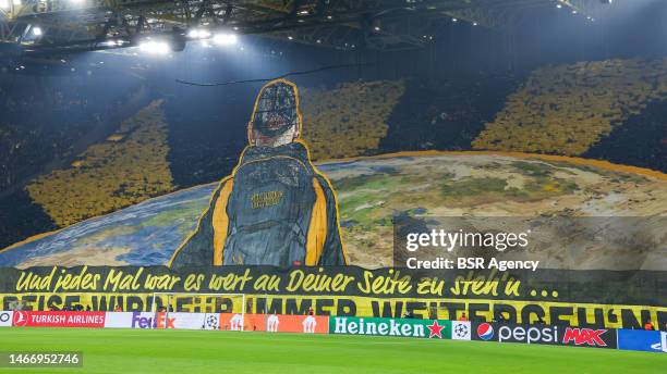 Fans of Borussia Dortmund in Die Gelbe Wand during the UEFA Champions Round of 16, 1st leg match between Borussia Dortmund and Chelsea at Signal...