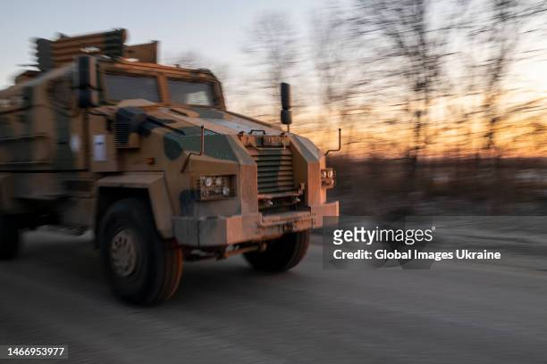 Vehicle drives a road near Ukrainian position on January 10, 2023 in Donetsk Oblast, Ukraine. Russian occupation forces, continuing to focus their...