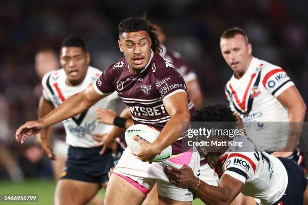 Kelma Tuilagi of the Sea Eagles is tackled during the NRL Trial Match between the Sydney Roosters and the Manly Sea Eagles at Central Coast Stadium...