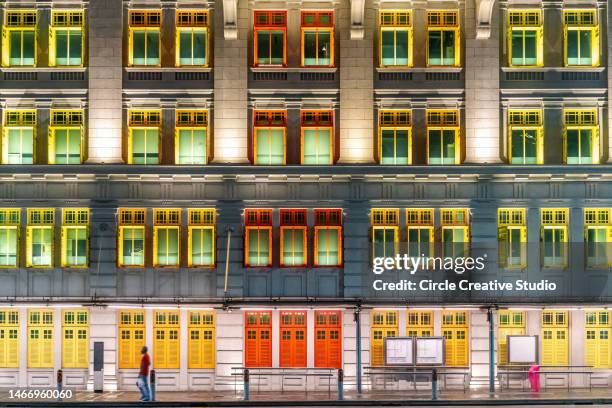 the old hill street police station in singapore at night - department of defense stock pictures, royalty-free photos & images