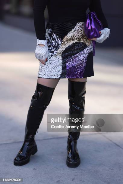 Olga Ferrara seen wearing Fallonandava black turtleneck, Seymoure white leather pearl pattern gloves, Phillip Lim black with purple sequins pattern...
