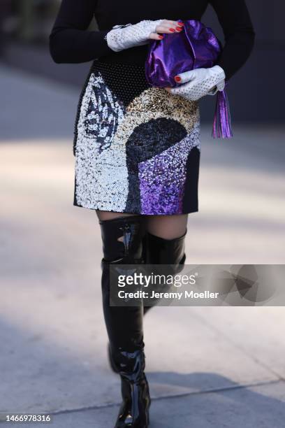 Olga Ferrara seen wearing Fallonandava black turtleneck, Seymoure white leather pearl pattern gloves, Phillip Lim black with purple sequins pattern...