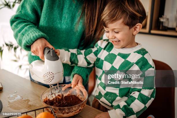 i have the best assistant - woman cooking dessert bildbanksfoton och bilder