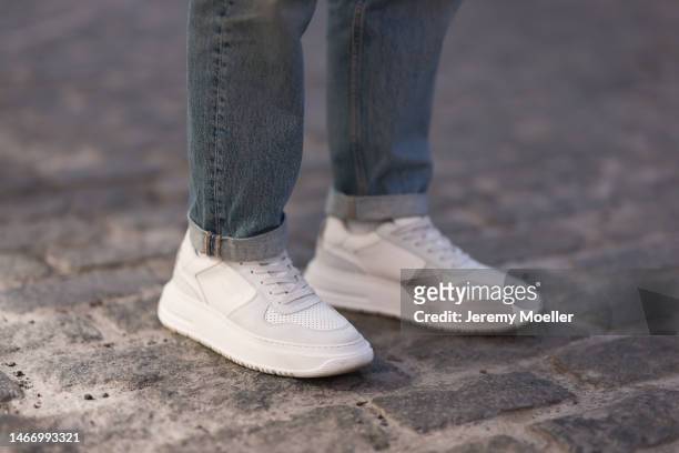 Gregor Wolski seen wearing Levi’s blue denim jeans pants, Copenhagen Studios white leather sneakers, during New York Fashion Week, on February 15,...