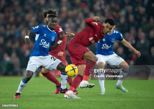 Cody Gakpo of Liverpool and Idrissa Gueye of Everton in action during the Premier League match between Liverpool FC and Everton FC at Anfield on...