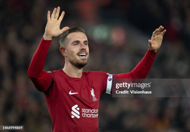 Jordan Henderson of Liverpool celebrates a goal during the Premier League match between Liverpool FC and Everton FC at Anfield on February 13, 2023...