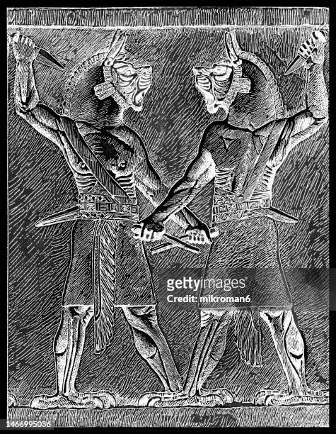 old engraved illustration of assyrian alabaster panel from the palace at nineveh, 645-635 bce depicts a pair of protective spirits known as an "ugallu" – a protective lion - ninawa stock pictures, royalty-free photos & images