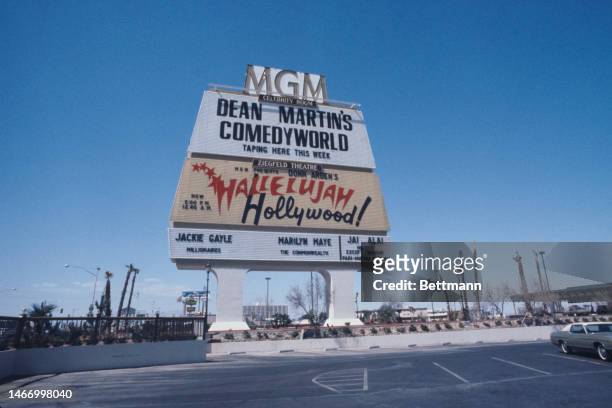 View of a sign listing forthcoming star appearances at the new MGM Grand hotel in Las Vegas, California, in May 1974. They are Dean Martin's 'Comedy...
