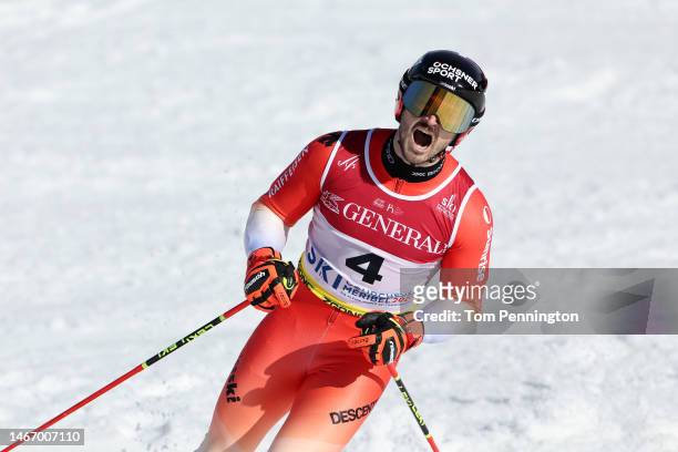 Loic Meillard of Switzerland celebrates following their second run of Men's Giant Slalom at the FIS Alpine World Ski Championships on February 17,...