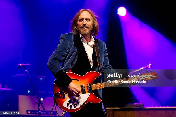 Tom Petty of Tom Petty and the Heartbreakers performs on the main stage on day 2 of The Isle of Wight Festival at Seaclose Park on June 22, 2012 in...