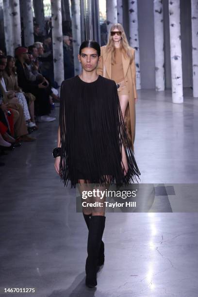 Model walks the runway during the A/W 2023 Michael Kors New York Fashion Week Show on February 15, 2023 in New York City.