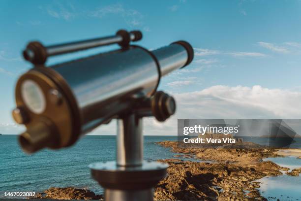 detail of tourist telescope viewpoint in beach skyline at sunset - france skyline stock pictures, royalty-free photos & images