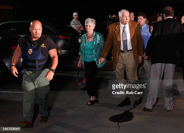 Former Penn State assistant football coach Jerry Sandusky and his wife Dottie arrive at his child sex abuse trial at the Centre County Courthouse on...