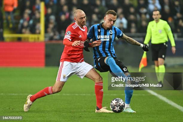 Noa Lang of Club Brugge battles for the ball with Fredrik Aursnes of Benfica during the UEFA Champions League season 2022 - 2023 1/8 finals, 1st leg...