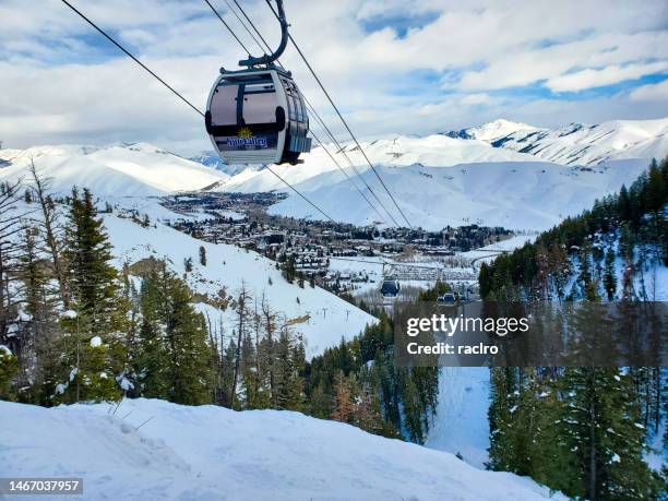 the roundhouse express gondola, sun valley ski resort, idaho, with the town in the background. - ketchum idaho stock pictures, royalty-free photos & images