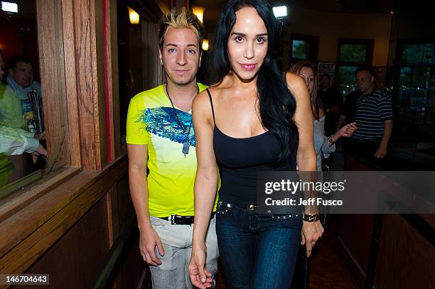 Adam Barta and Nadya 'Octomom' Suleman arrive at the Celebrity Pillow Fight Press Conference and Weigh In at the Fox And Hound Pub and Grille on June...