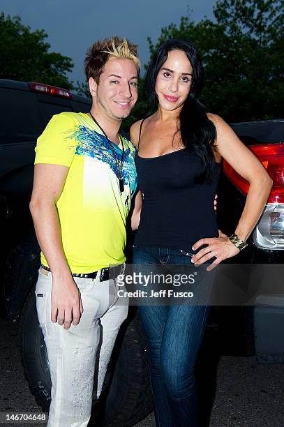 Adam Barta and Nadya 'Octomom' Suleman pose at the Celebrity Pillow Fight Press Conference and Weigh In at the Fox And Hound Pub and Grille on June...