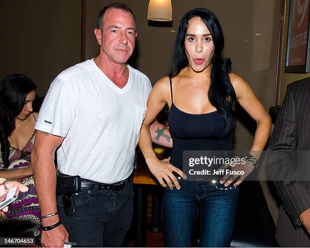 Michael Lohan and Nadya 'Octomom' Suleman pose at the Celebrity Pillow Fight Press Conference and Weigh In at the Fox And Hound Pub and Grille on...