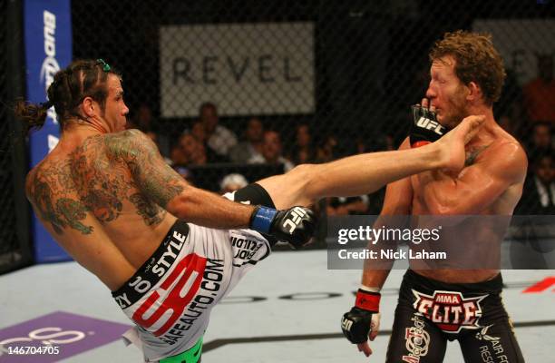 Clay Guida throws a kick against Gray Maynard in the main event lightweight bout during UFC on FX 4 at Revel Casino on June 22, 2012 in Atlantic...