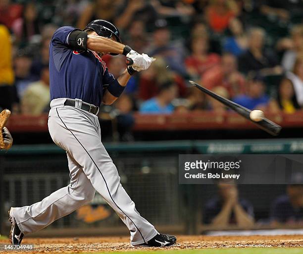 Lonnie Chisenhall of the Cleveland Indians breaks his bat in the fifth inning against the Houston Astros at Minute Maid Park on June 22, 2012 in...