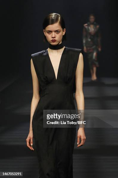A model walks the runway at the Huishan Zhang show during London ...
