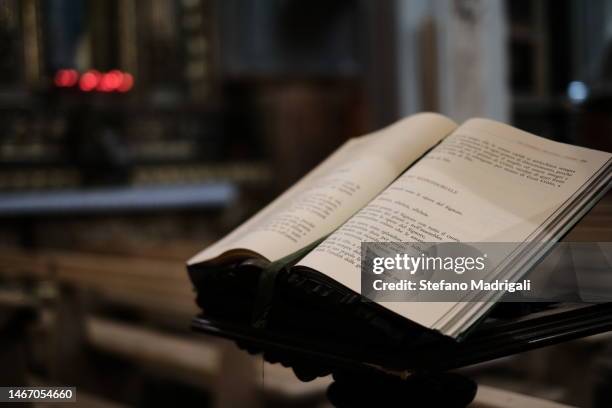 prayer book on the lectern in the church - bookstand stock pictures, royalty-free photos & images