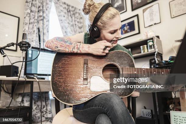 1,287 Guitar Tattoo Designs Photos and Premium High Res Pictures - Getty Images 1,287 Guitar Tattoo Designs Photos and Premium High Res Pictures - Getty Images
