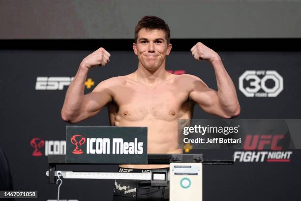 Alexander Hernandez poses on the scale during the UFC Fight Night weigh-in at UFC APEX on February 17, 2023 in Las Vegas, Nevada.