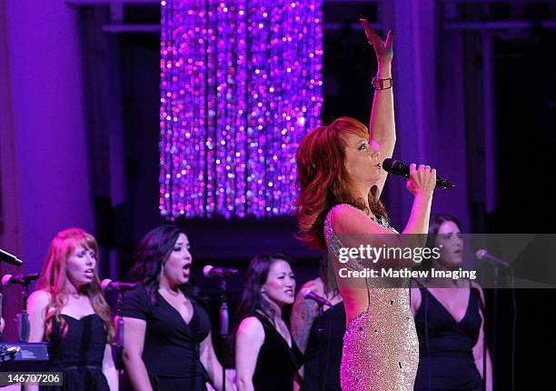 Singer and Hollywood Bowl Hall of Fame inductee Reba McEntire performs onstage at the Hollywood Bowl Opening Night Gala on June 22, 2012 in...