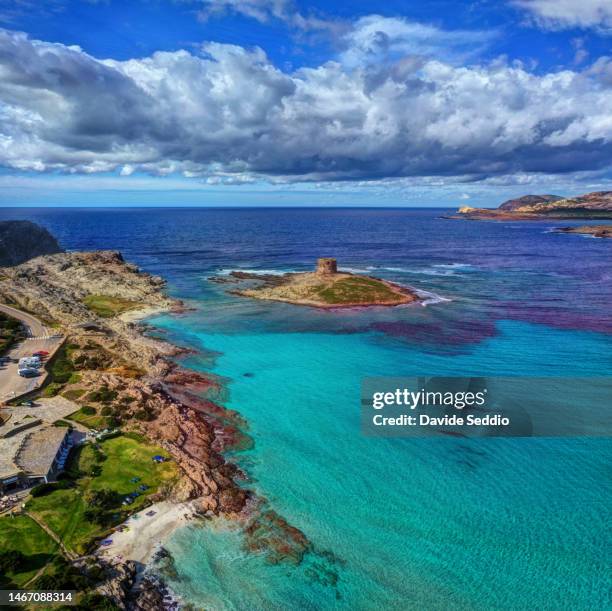 aerial view of the tower of the pelosa beach (torre della pelosa) - stintino stock pictures, royalty-free photos & images