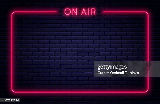 on air neon signboard. on air neon light sign with glowing letters and frame. bright banner and poster template for live interview, broadcast and podcast - broadcast-studio-background stock illustrations