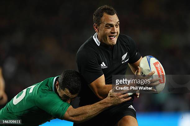 Israel Dagg of the All Blacks is tackled by Rob Kearney of Ireland during the International Test Match between New Zealand and Ireland at Waikato...